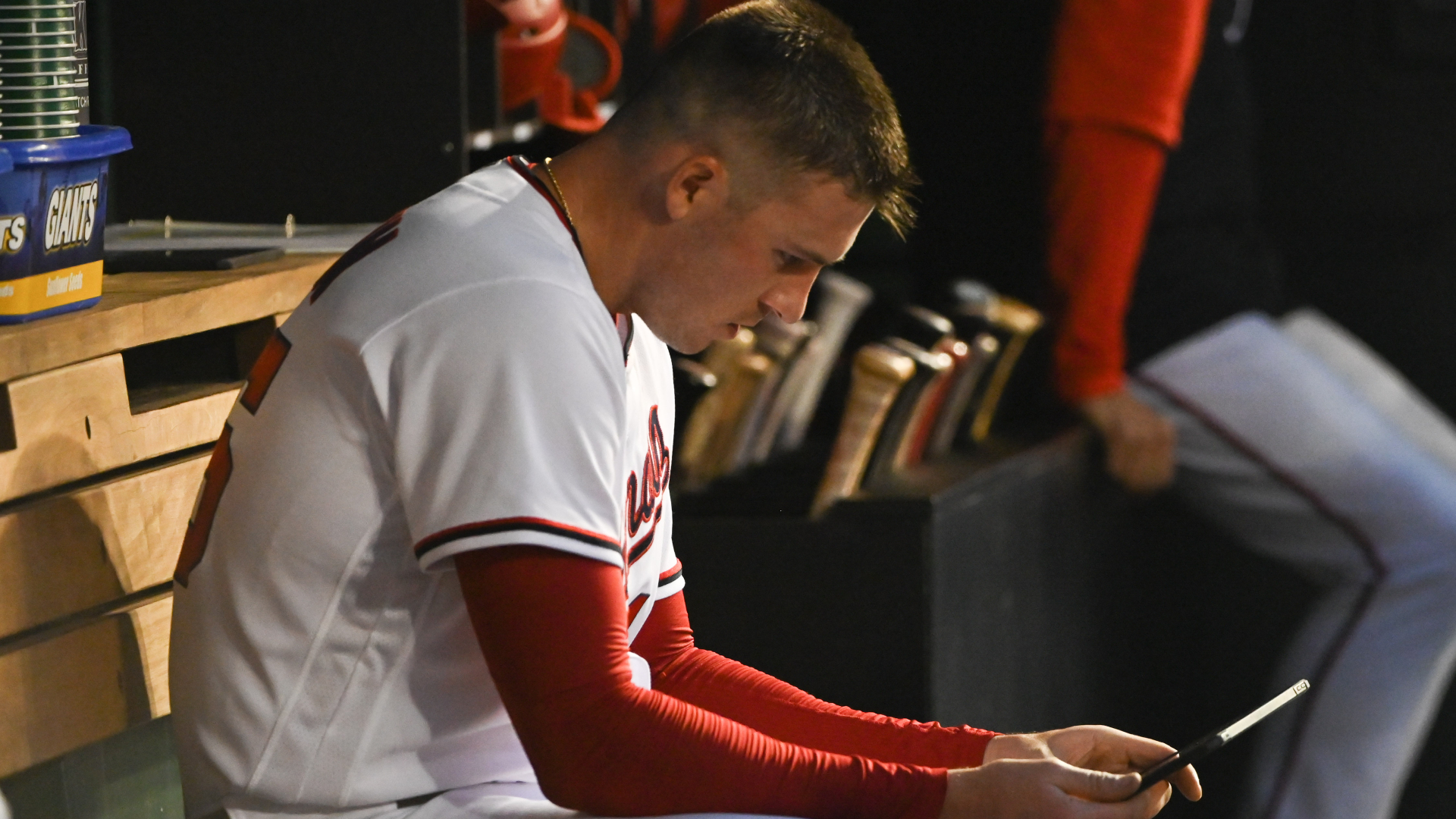 Patrick Corbin studies a tablet during his start against the Giants