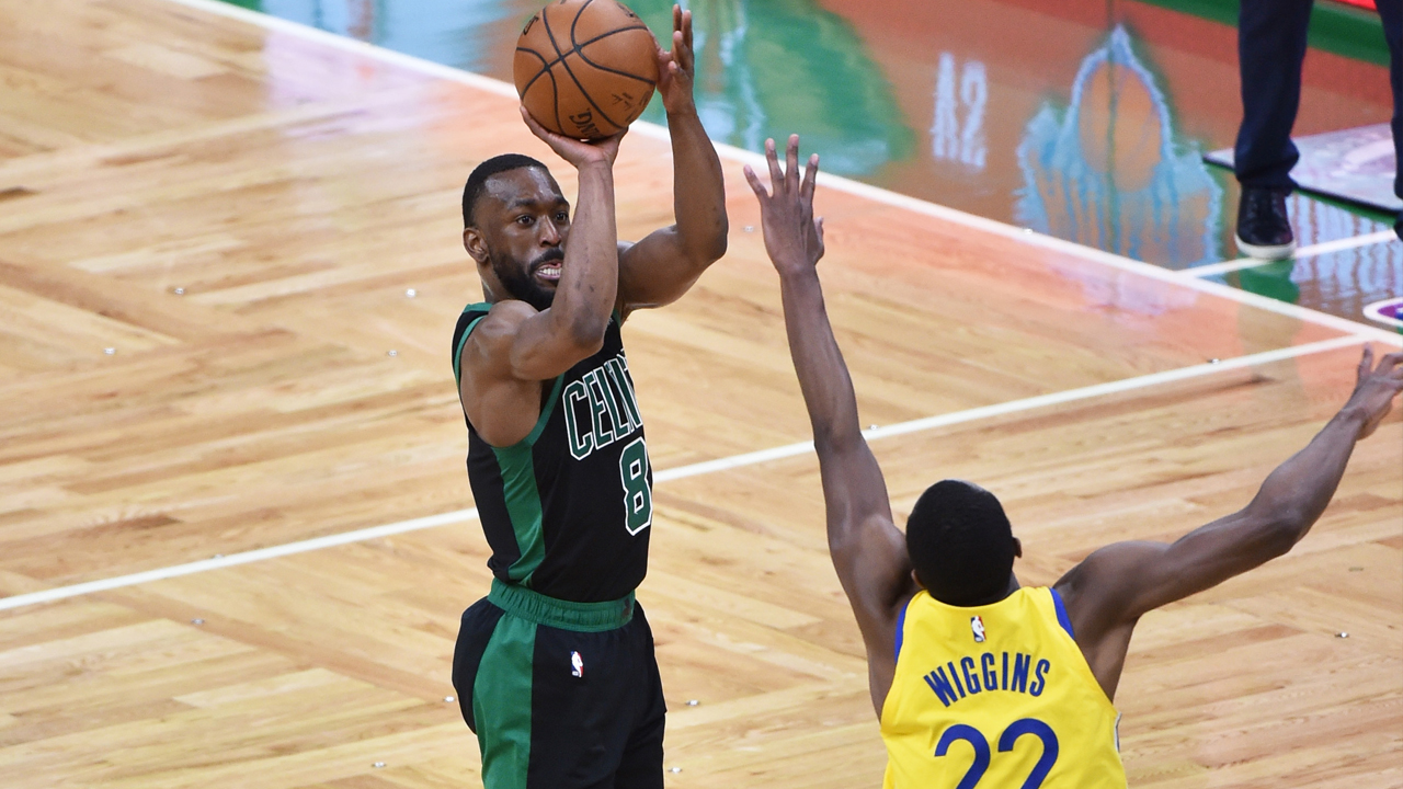 Warriors' Andrew Wiggins guarding Celtics' Kemba Walker