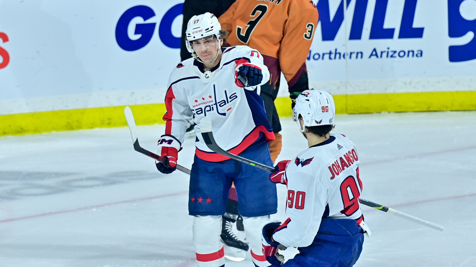 Capitals center Dylan Strome celebrates with left wing Marcus Johansson after scoring a goal against the Coyotes