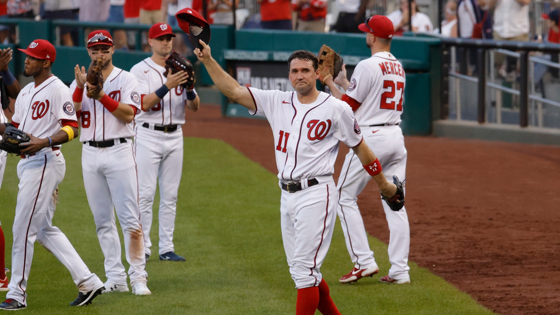 Ryan Zimmerman waves to the crowd after being removed from his final game at Nationals Park