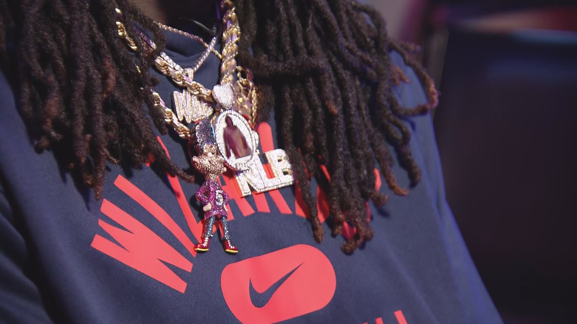 Montrezl Harrell demonstrates and points out his custom jewellery selection to NBCSW